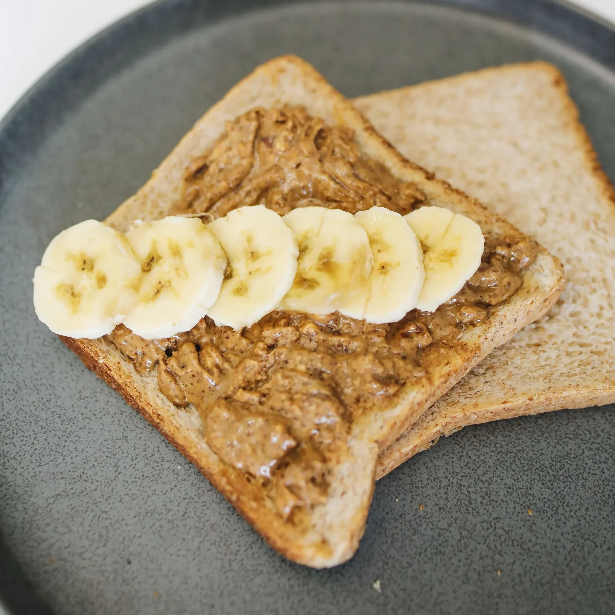banana sliced almond butter plate