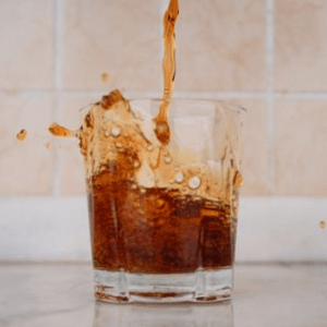 kombucha glass pouring fizzy tea