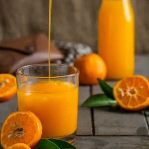 orange juice glass pouring