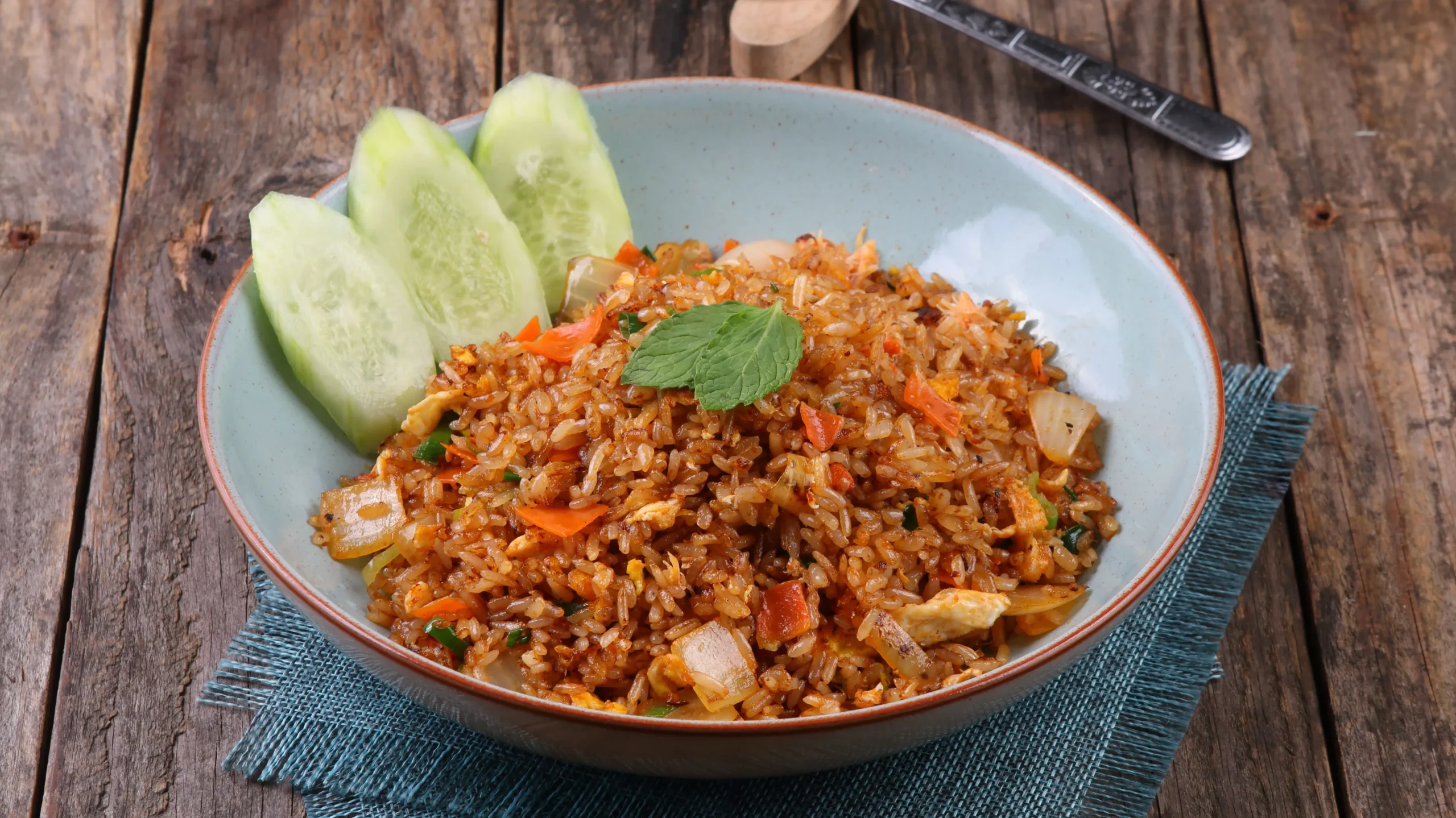 takeaway grain bowl brown rice vegetables office desk